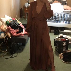 Brown maxi dress with a side slit on the right.